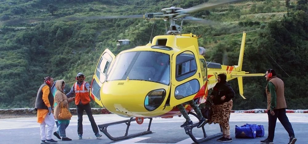 Guests boarding a helicopter for the Kedarnath sector of Char Dham Yatra